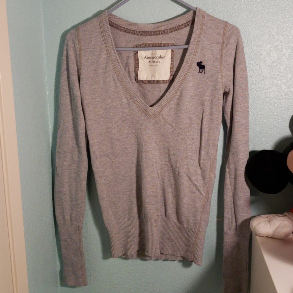 Gray V-neck sweater